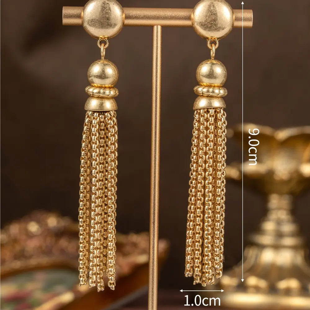 Parure collier et boucles d'oreilles femme pompon or de luxe