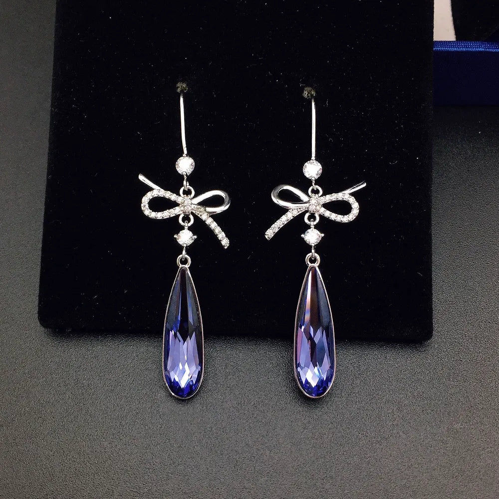 Boucles d'oreilles pendantes de luxe en cristal bleu en forme de nœud pour femme