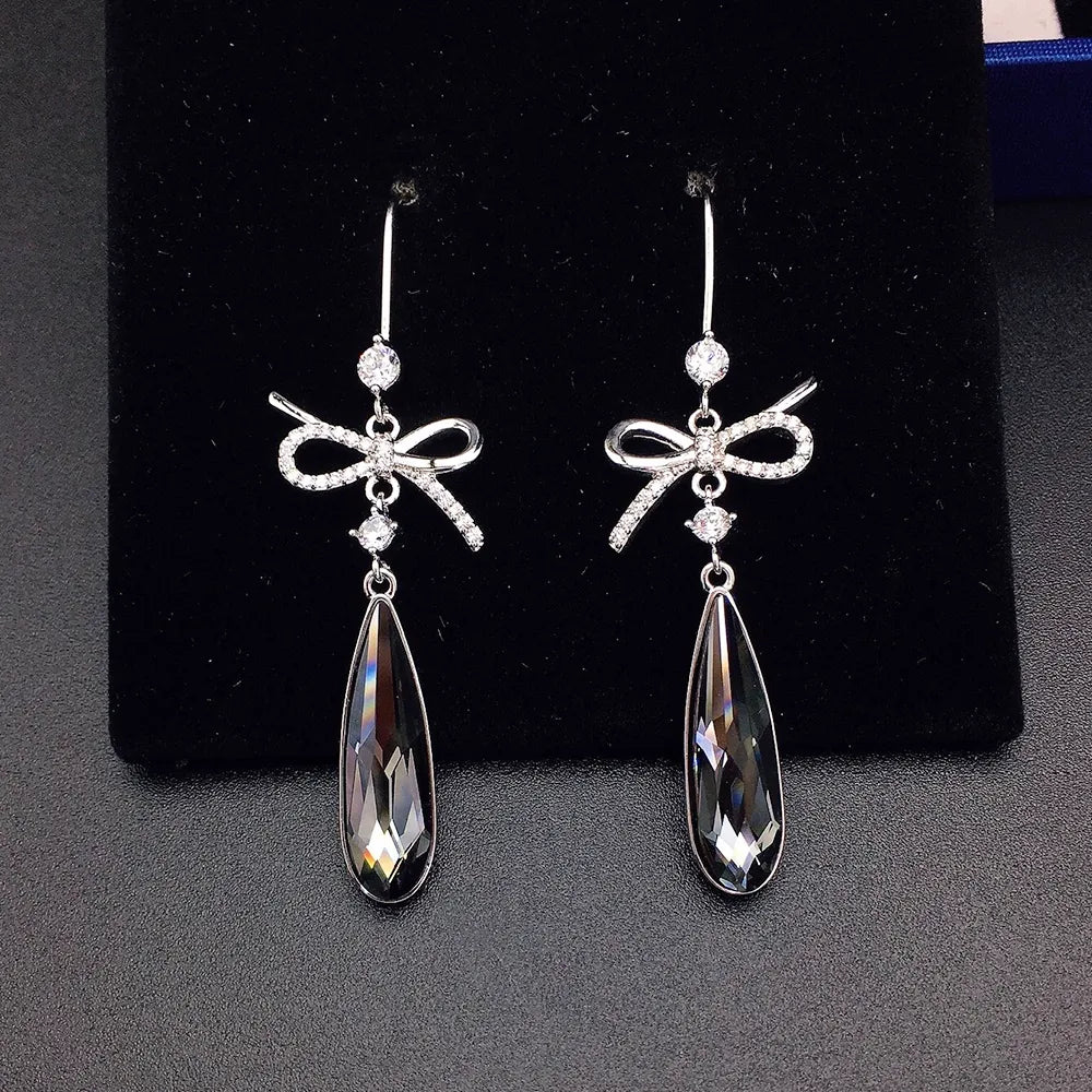 Boucles d'oreilles pendantes de luxe en cristal bleu en forme de nœud pour femme