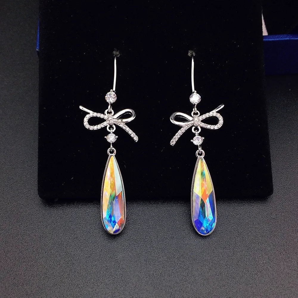 Boucles d'oreilles pendantes de luxe en cristal bleu en forme de nœud pour femme