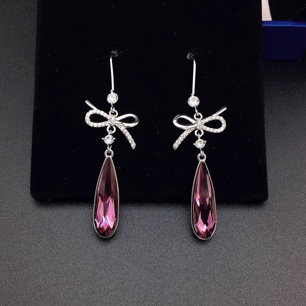 Boucles d'oreilles pendantes de luxe en cristal bleu en forme de nœud pour femme