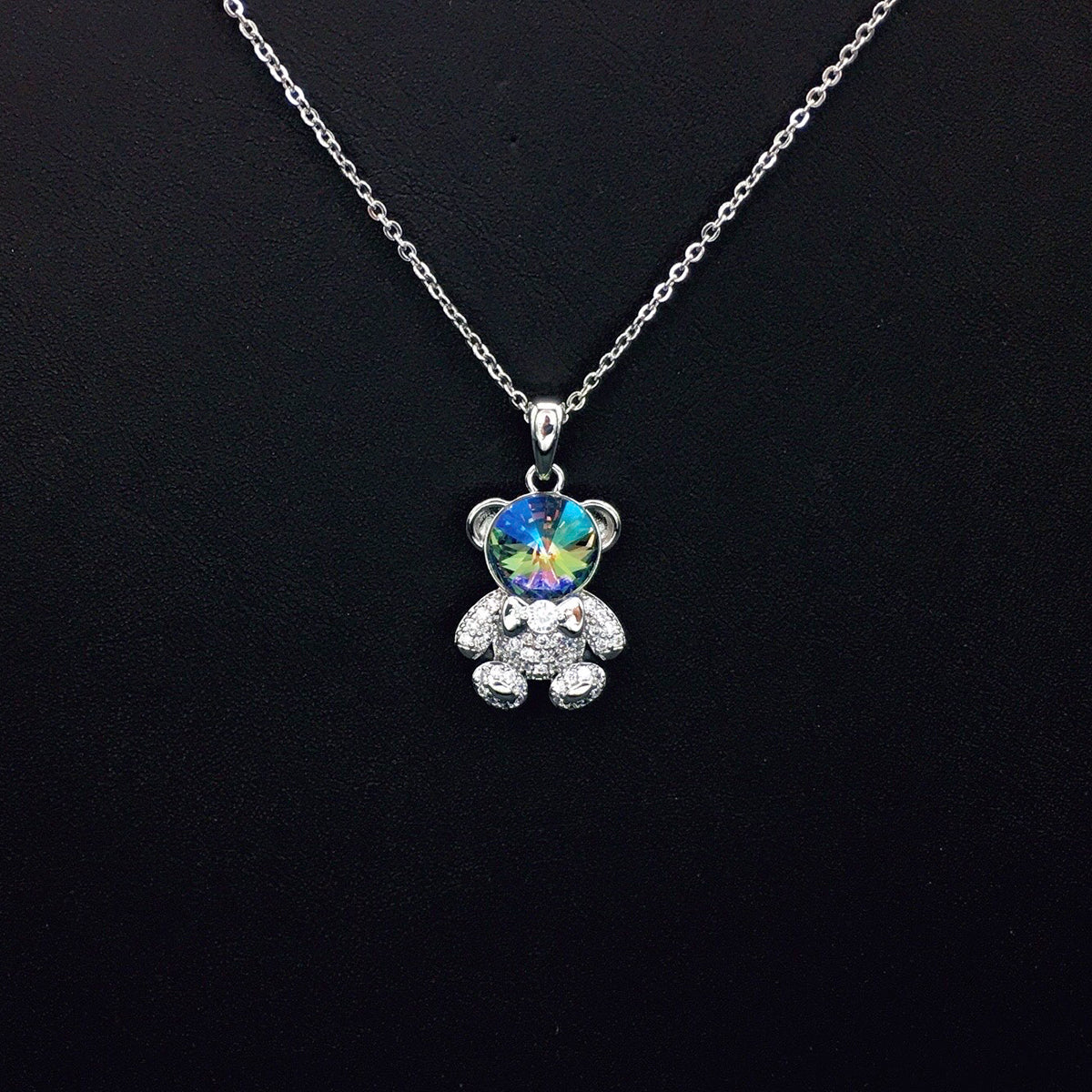 Delicate Gold Teddy Bear Necklace with Sparkling Blue Crystal as a Sweet Gift