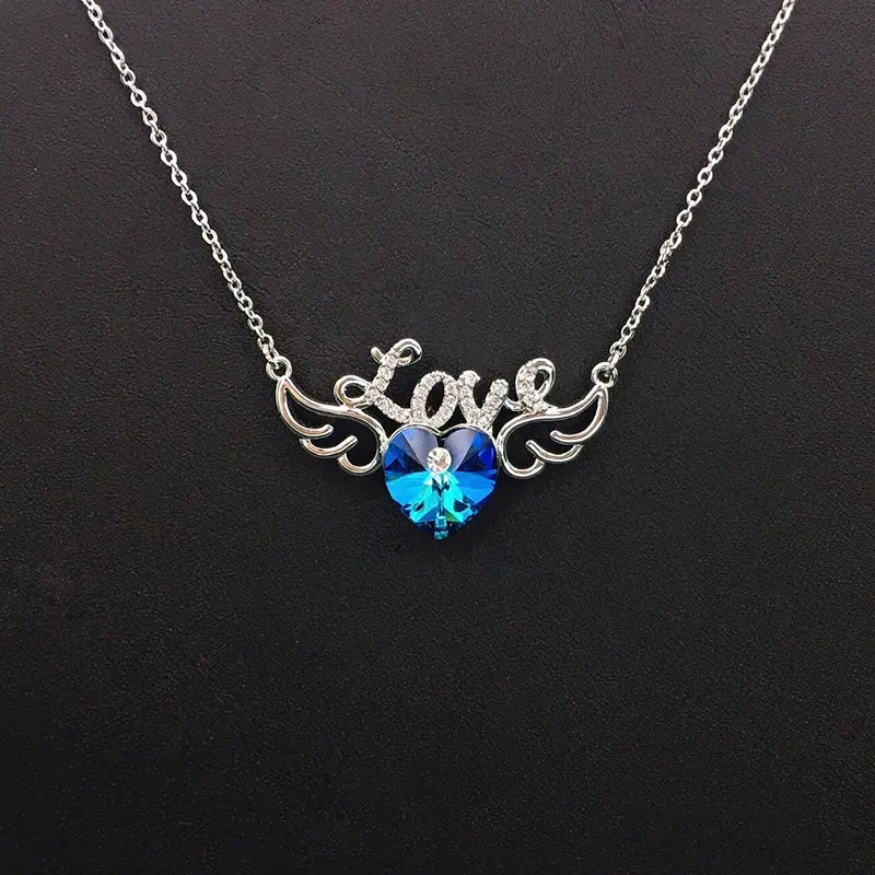 Collier Ailes Cœur Scintillant Cristal Bleu pour Rendez-vous Romantiques