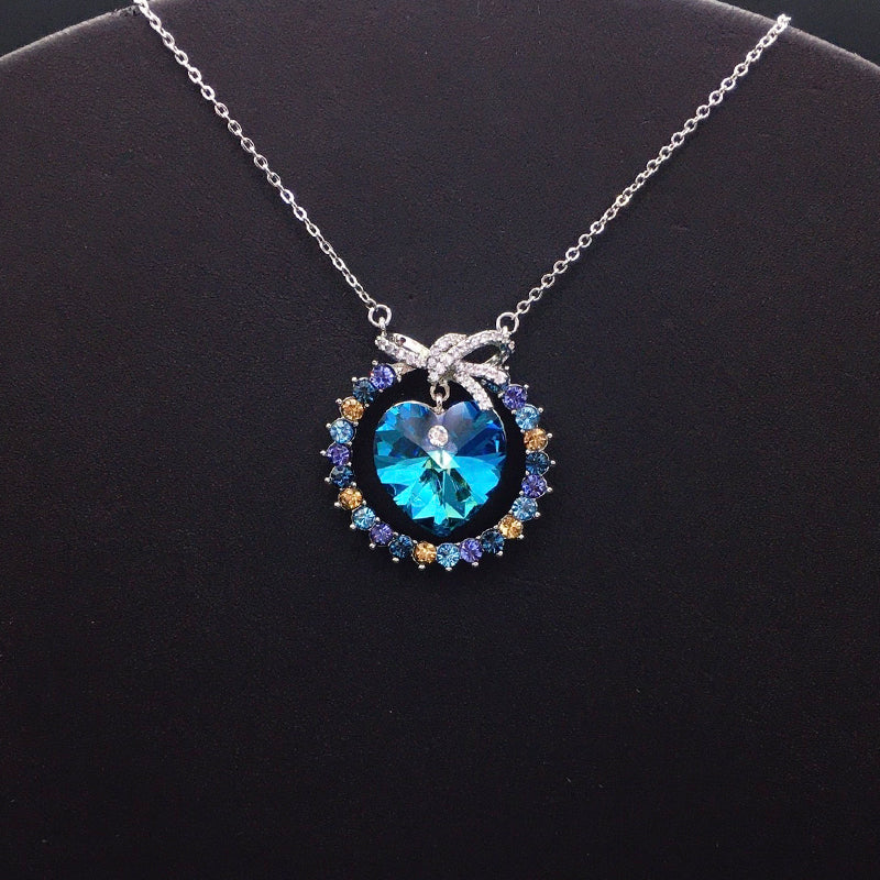 Elegant Silver Necklace with Multicolored Heart Crystal and Bow for Formal Galas