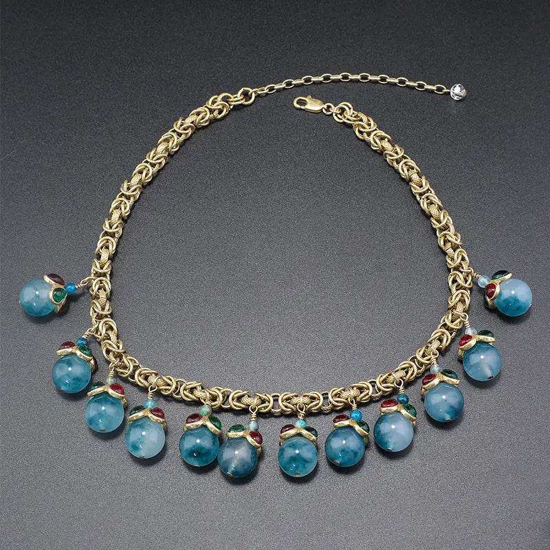 Ensemble de Bijoux Chic en Or avec Accents de Pierres Bleues pour une Sophistication Quotidienne