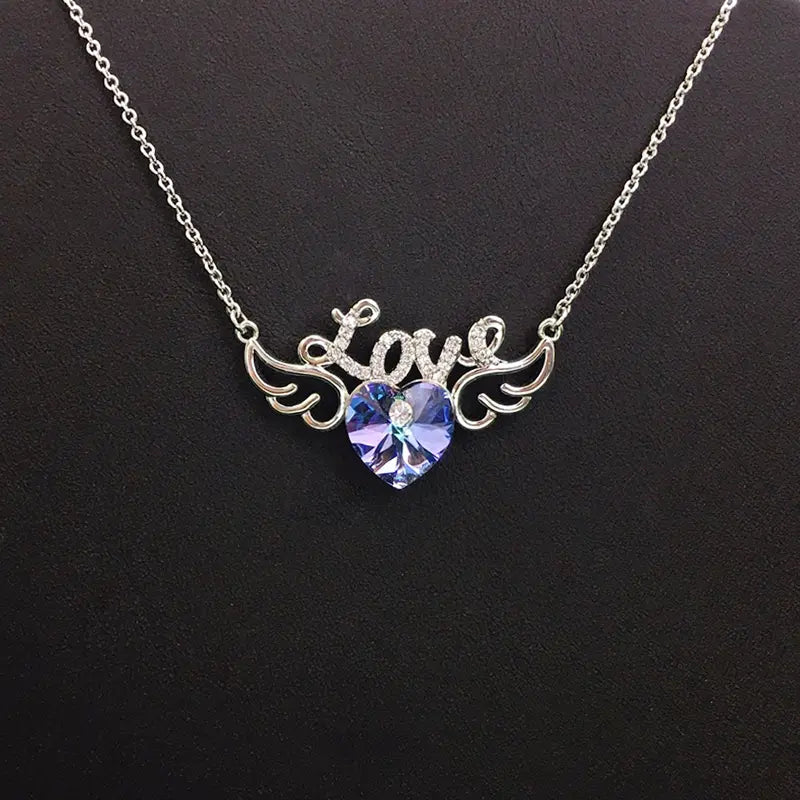 Collier Ailes Cœur Scintillant Cristal Bleu pour Rendez-vous Romantiques
