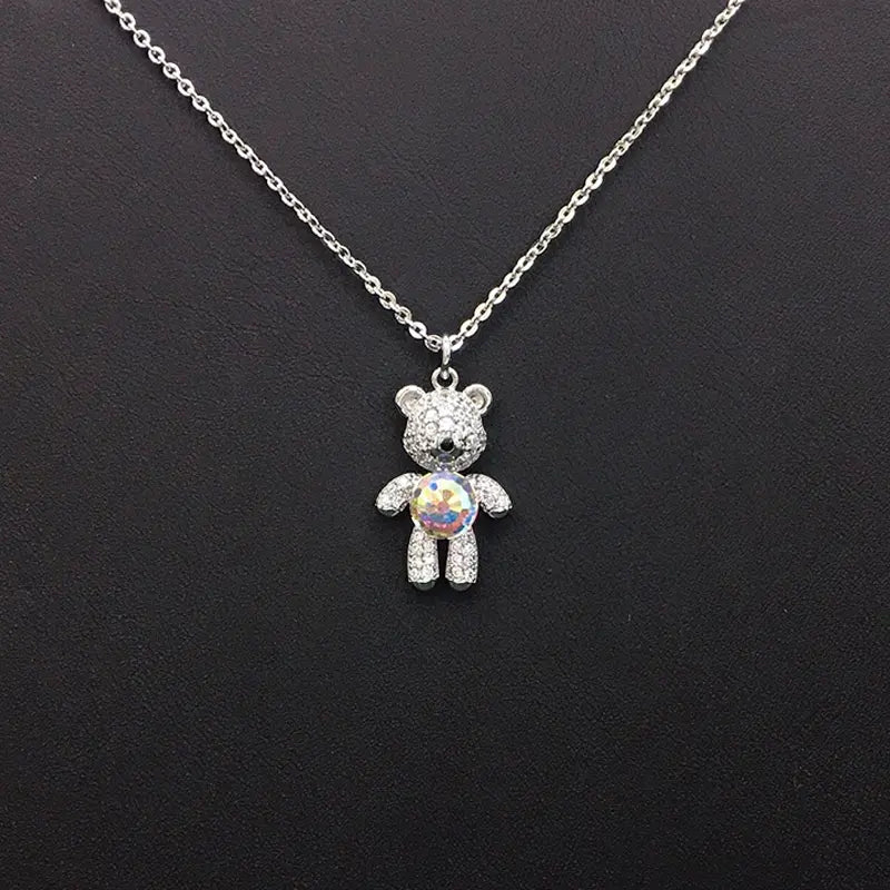 Joli collier ourson doré avec étoile en cristal bleu pour un chic au quotidien