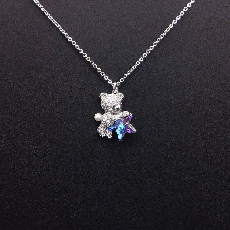 Sweet Gold Teddy Bear Necklace with Blue Star Crystal & Pearl – A Thoughtful Gift Idea