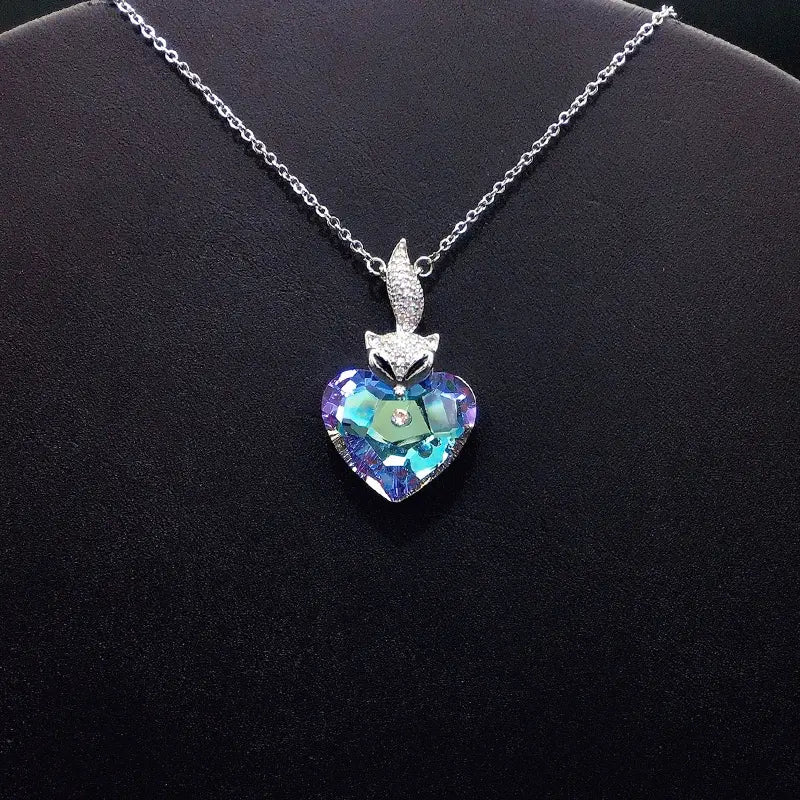 Élégant Renard Argenté - Collier Cœur avec Cristal Bleu Profond pour Galas Formels