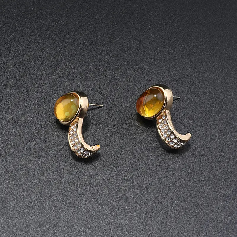 Parure de bijoux élégante en chaîne dorée avec pierres jaunes et bleues pour les événements formels