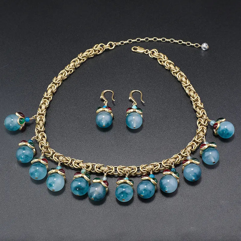 Ensemble de Bijoux Chic en Or avec Accents de Pierres Bleues pour une Sophistication Quotidienne