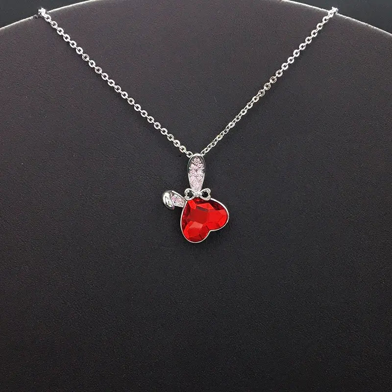 Élégant collier en cristal en forme de cœur argenté avec nœud pour les événements formels