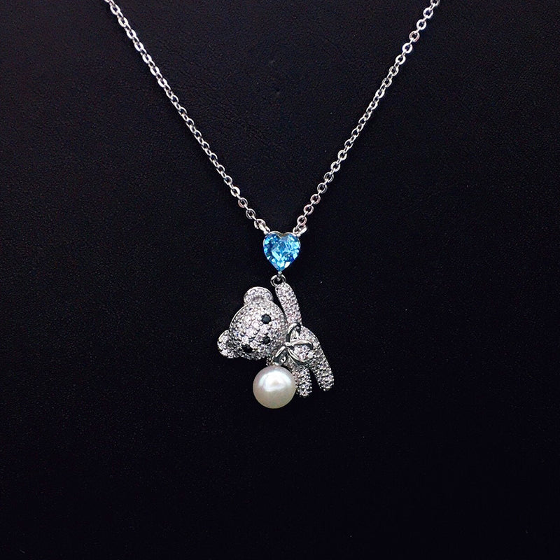 Sparkling Teddy Bear Necklace with Blue Heart Crystal & Pearl for Romantic Dates