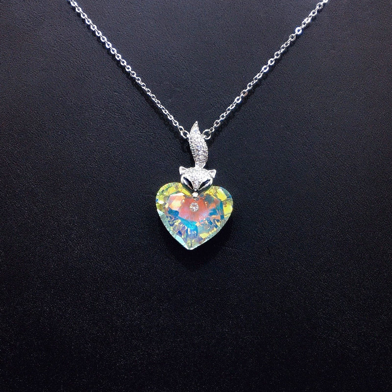 Elegant Silver Fox - Heart Necklace with Deep Blue Crystal for Formal Galas