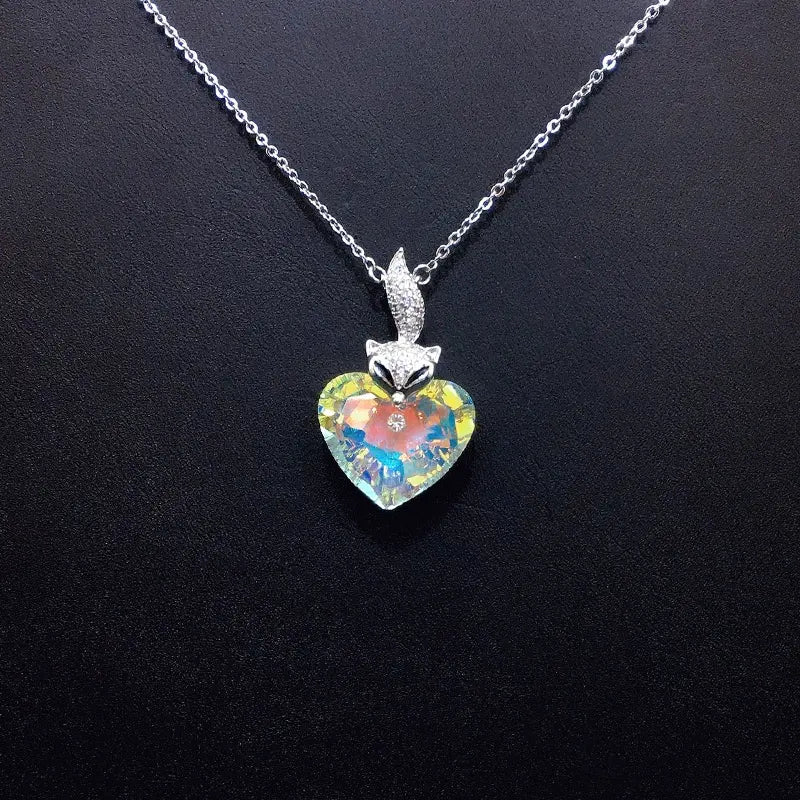 Élégant Renard Argenté - Collier Cœur avec Cristal Bleu Profond pour Galas Formels