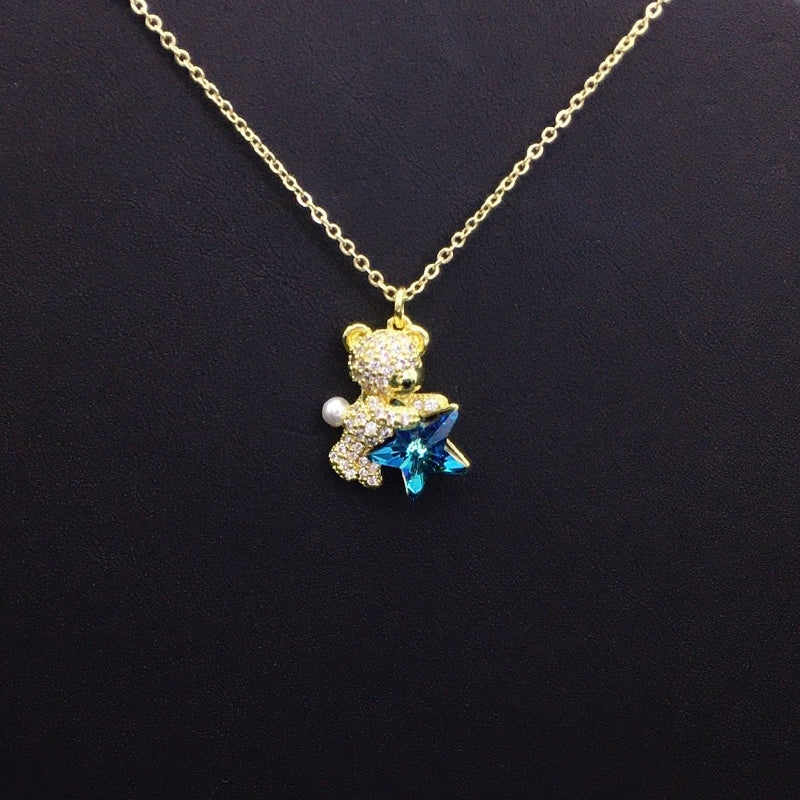 Sweet Gold Teddy Bear Necklace with Blue Star Crystal & Pearl – A Thoughtful Gift Idea