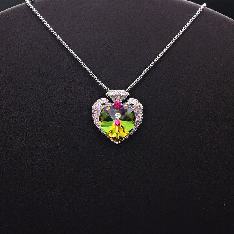 Elegant Silver Heart - shaped Necklace with Blue Crystal for Formal Events