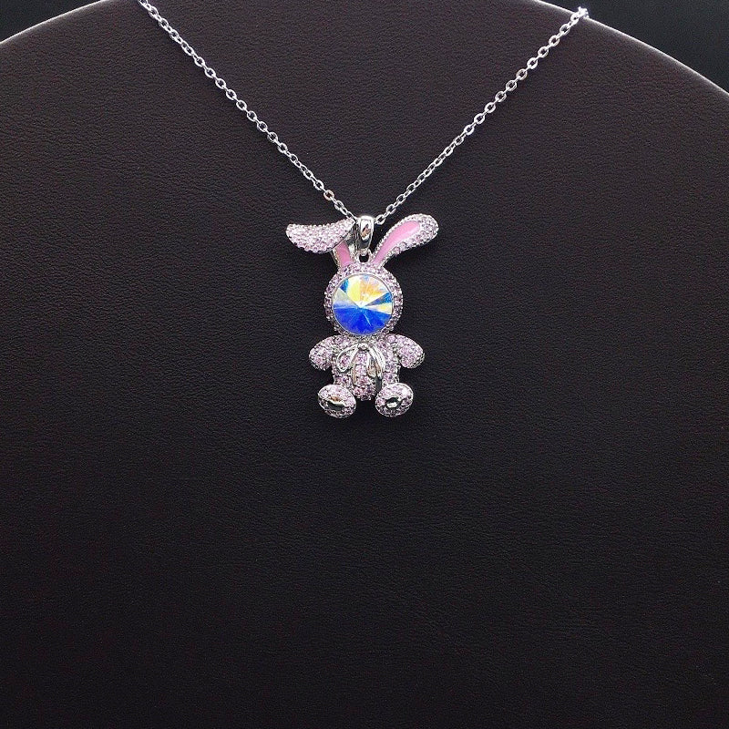 Elegant Silver Bunny Pendant with Pink Accents and Blue Crystal Face for Casual Playful Style