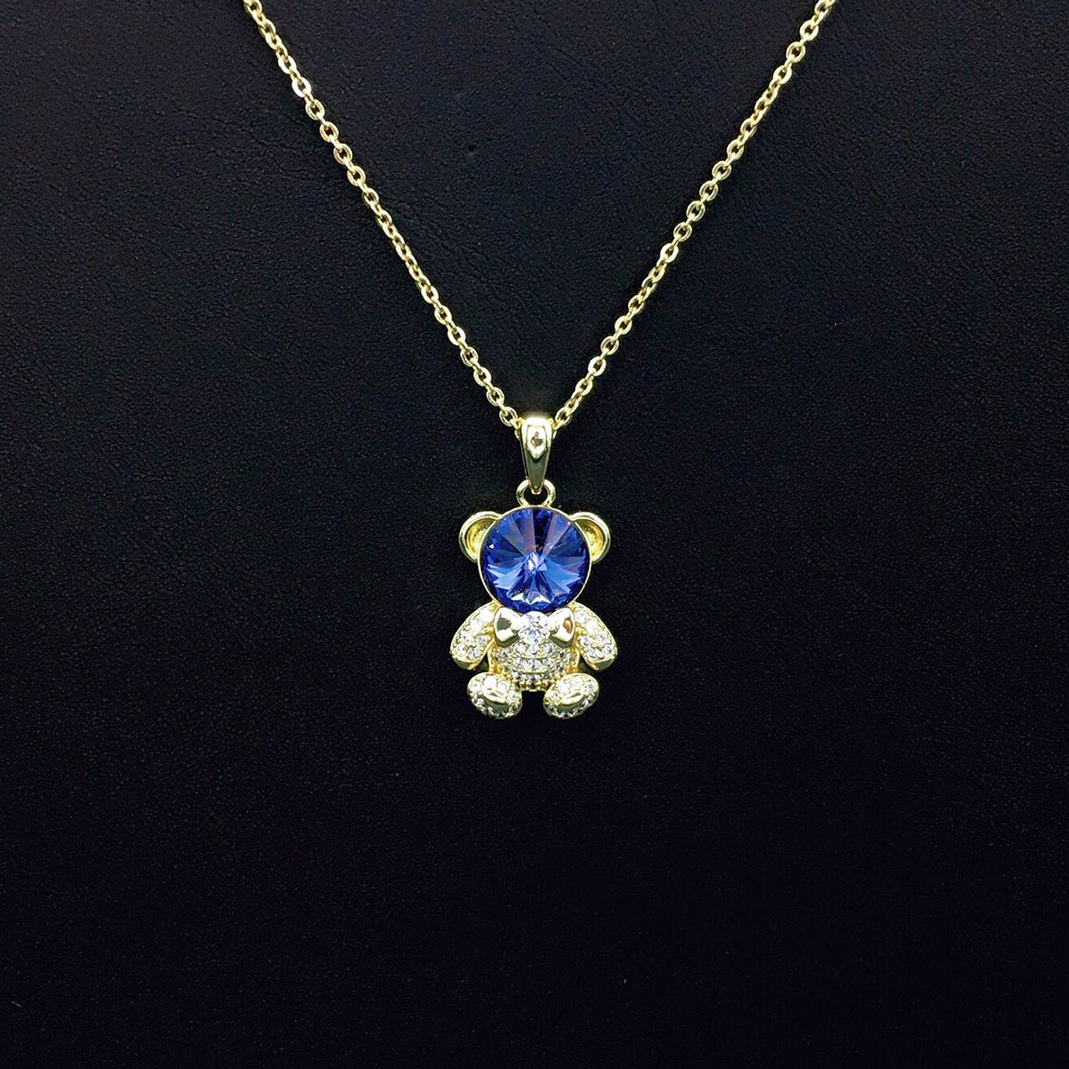 Delicate Gold Teddy Bear Necklace with Sparkling Blue Crystal as a Sweet Gift