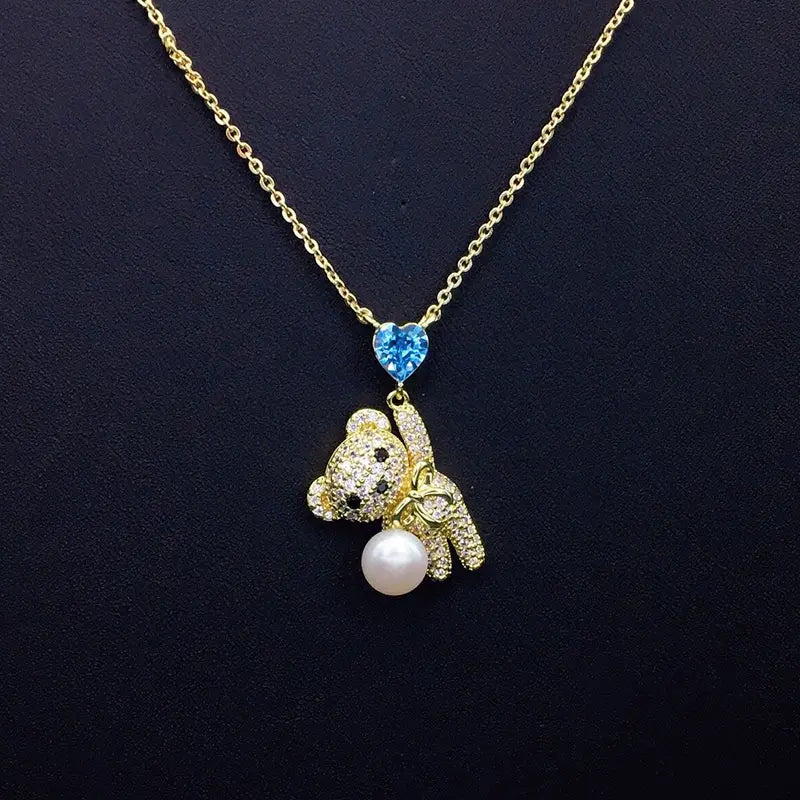 Collier Ours en Peluche Scintillant avec Cristal Cœur Bleu et Perle pour Rendez-vous Romantiques
