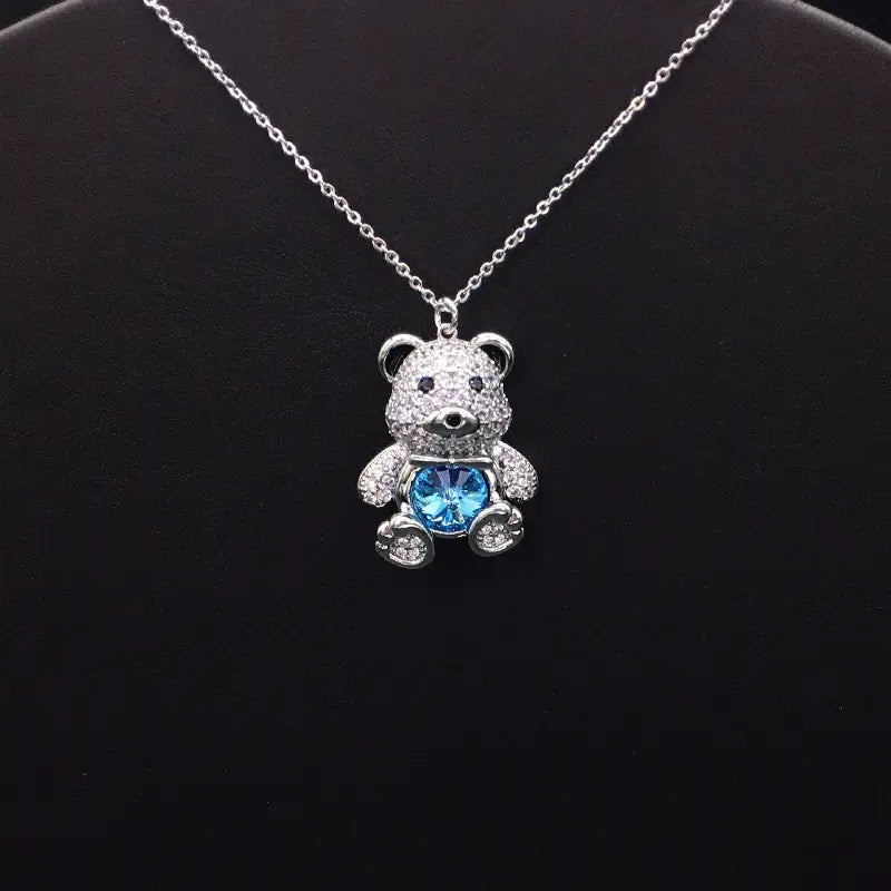 Collier élégant ourson en plaqué argent avec cristal bleu pour les occasions formelles
