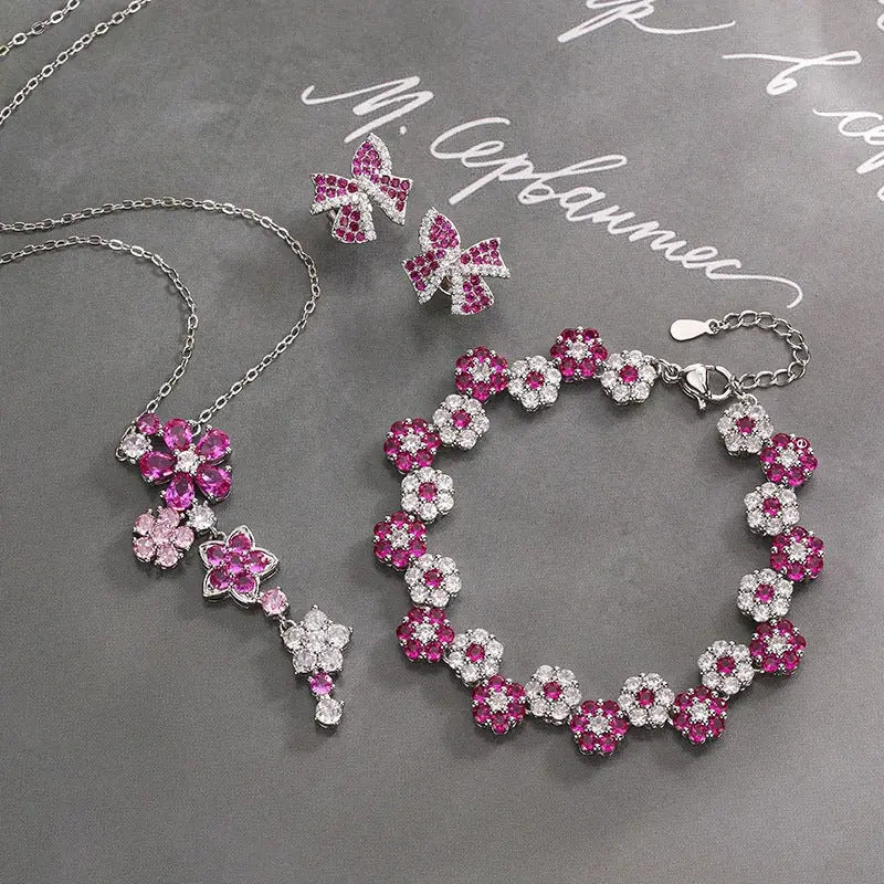 Parure de bijoux en forme de fleur de zircon bleu à la mode, collier, boucles d'oreilles et bracelet