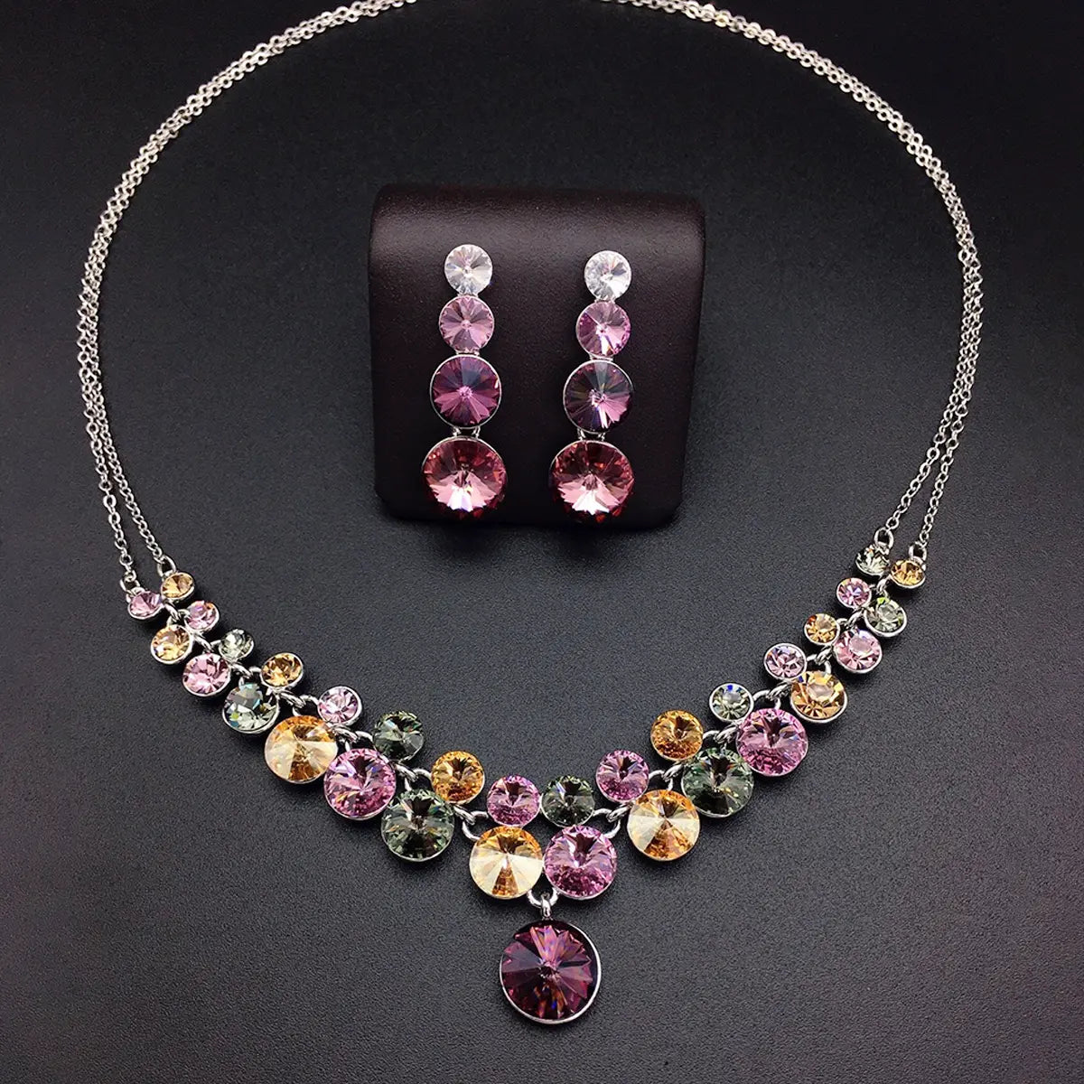 Parure collier imposant et boucles d'oreilles de luxe roses en cristal multicolore