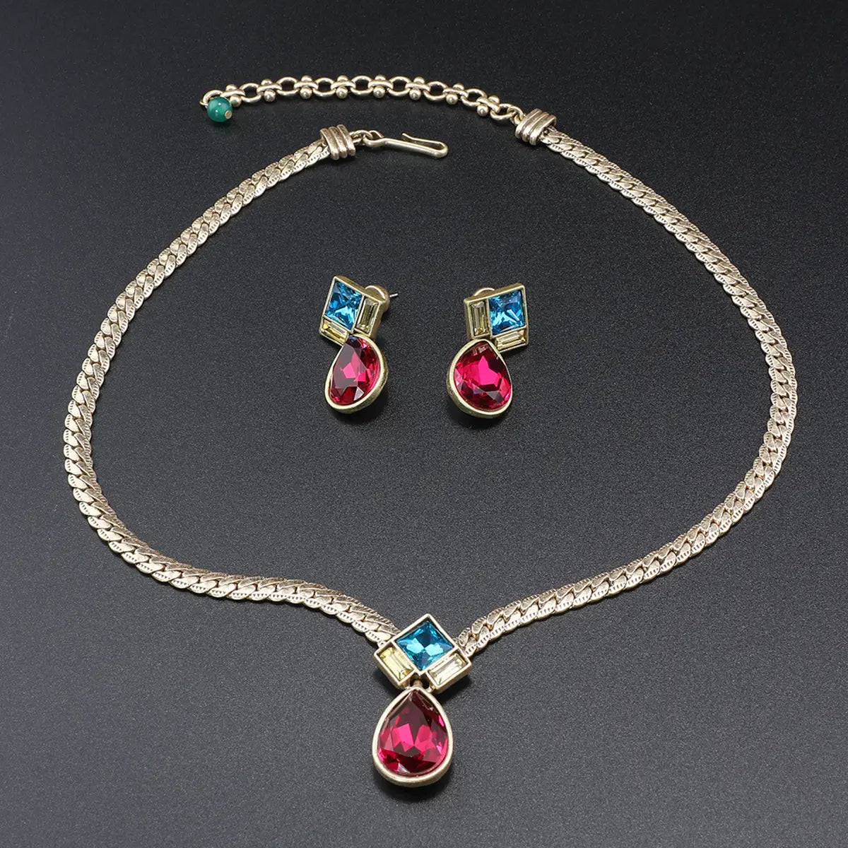 Collier et parure de bijoux de luxe vintage Collier serpent en os à pierres précieuses colorées