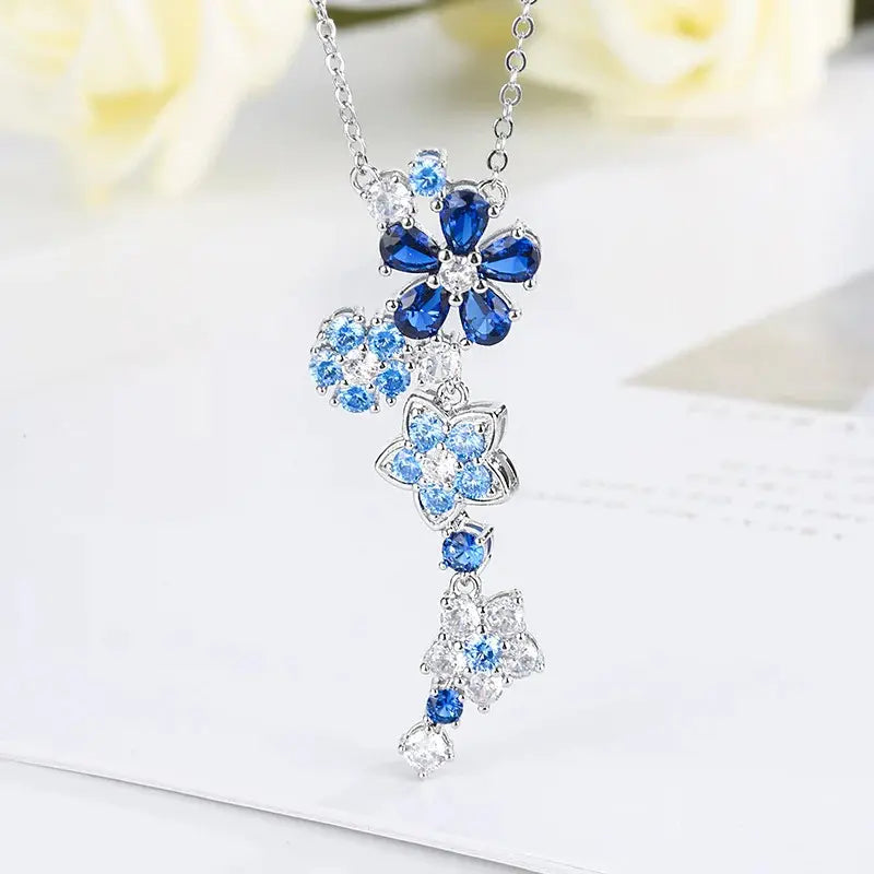 Parure de bijoux en zirconium avec des fleurs roses de luxe léger
