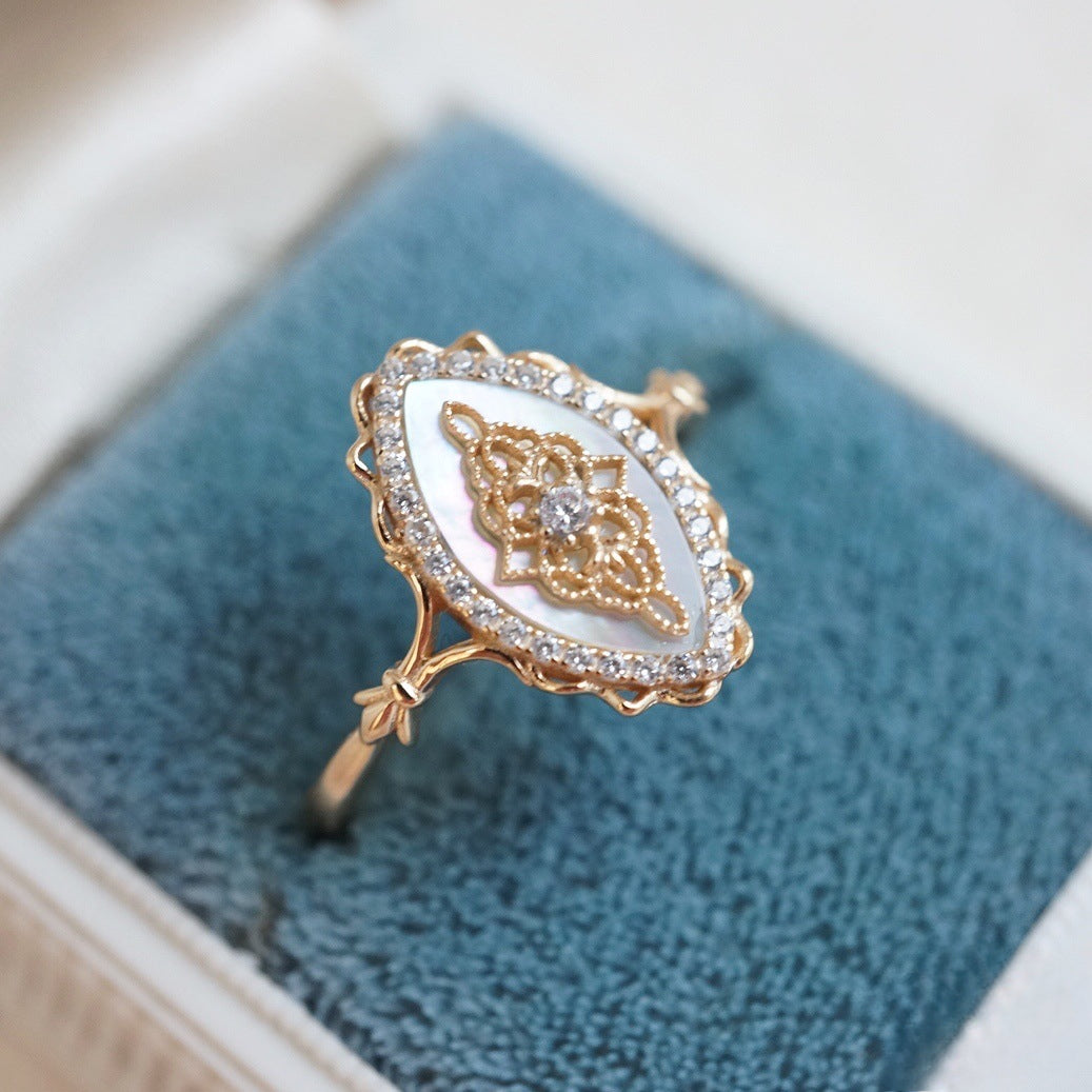 White shell hollow lace ring