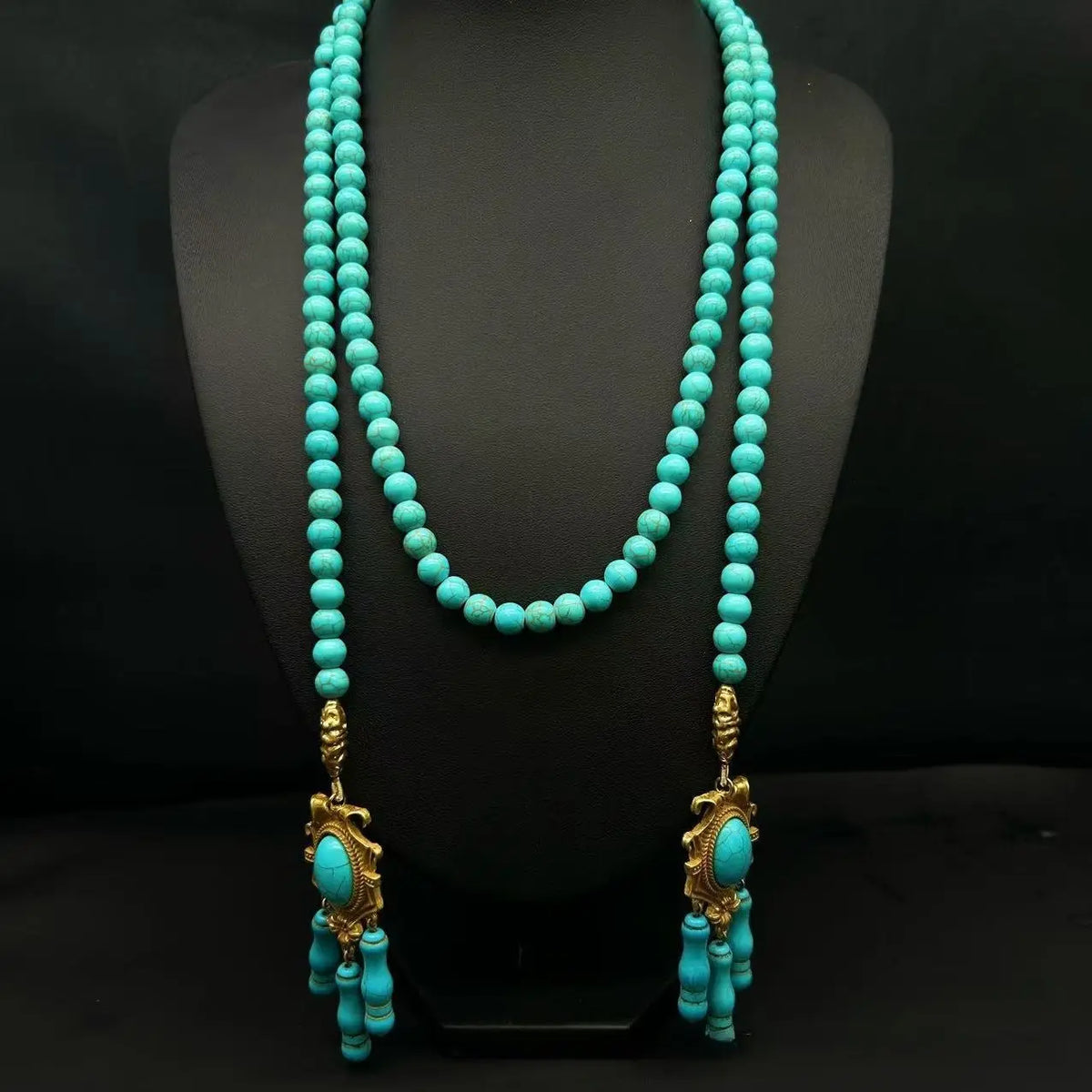 Parure collier et boucles d'oreilles vintage avec perles turquoise et pompon