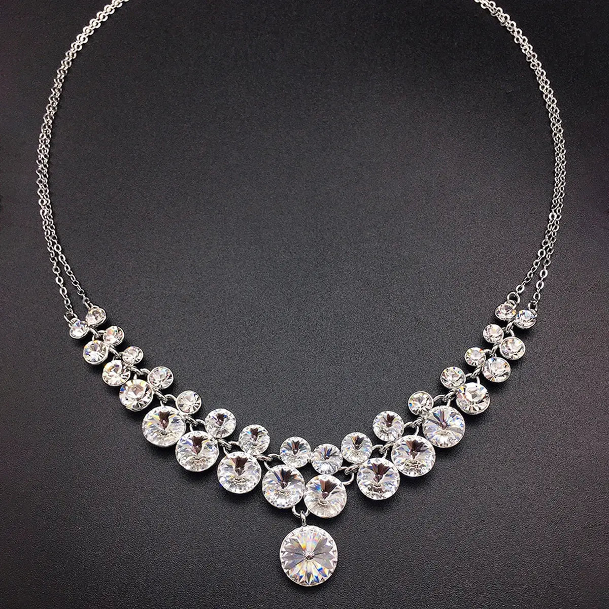 Parure collier imposant et boucles d'oreilles de luxe roses en cristal multicolore