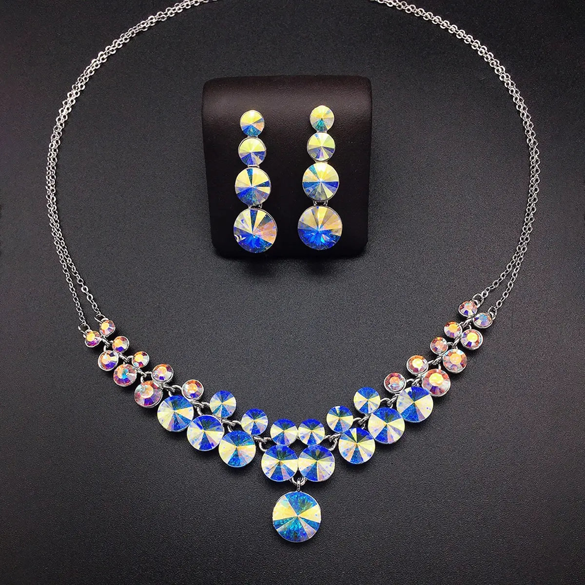 Parure collier imposant et boucles d'oreilles de luxe roses en cristal multicolore