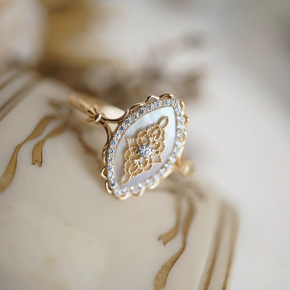 White shell hollow lace ring