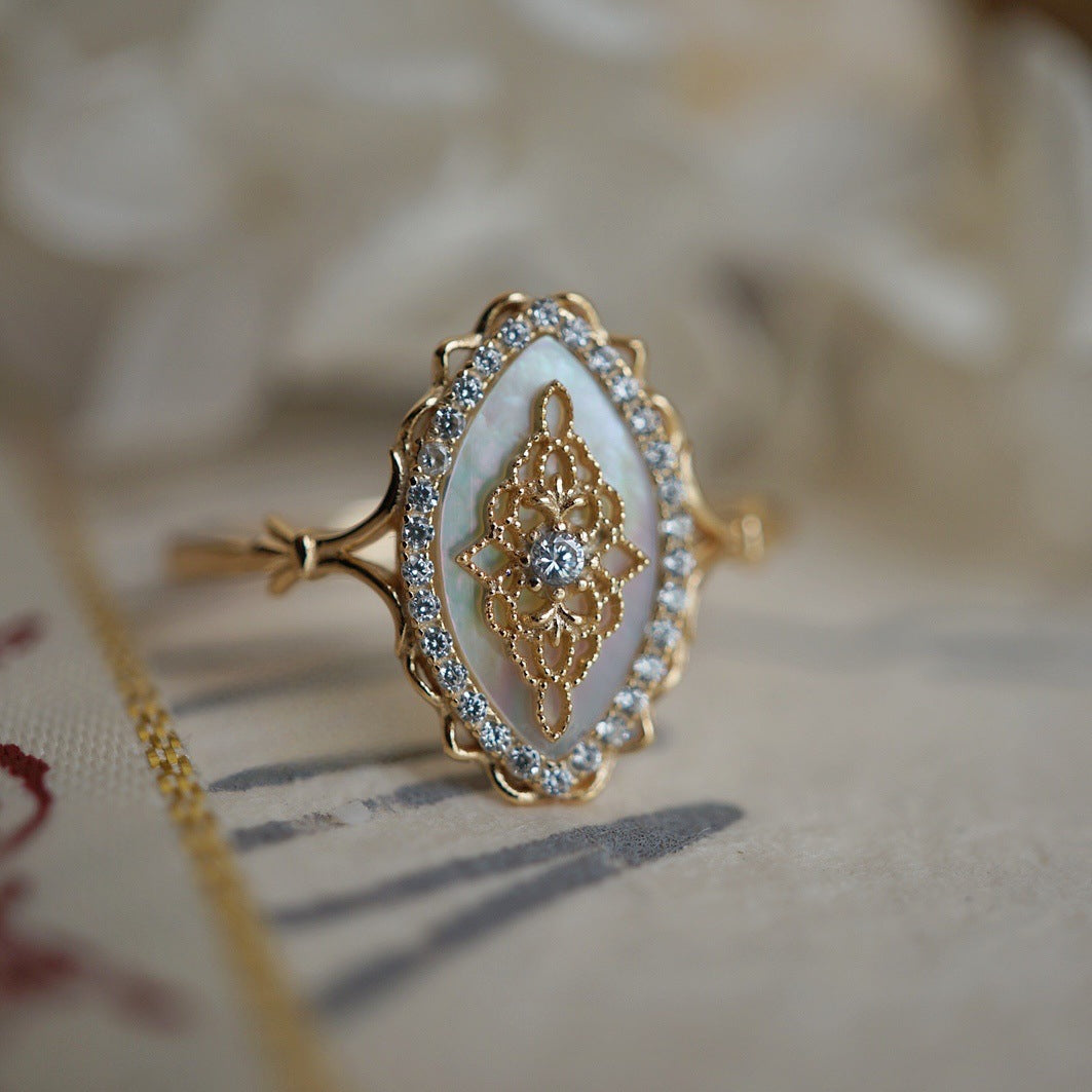 White shell hollow lace ring