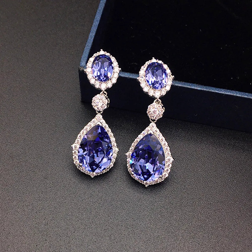 Boucles d'oreilles pendantes halo en cristal bleu saphir de luxe pour femme