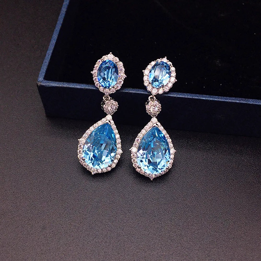 Boucles d'oreilles pendantes halo en cristal bleu saphir de luxe pour femme