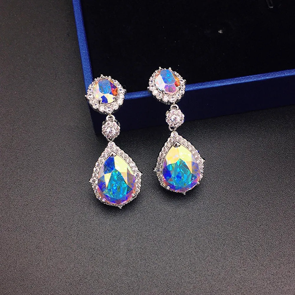 Boucles d'oreilles pendantes halo en cristal bleu saphir de luxe pour femme