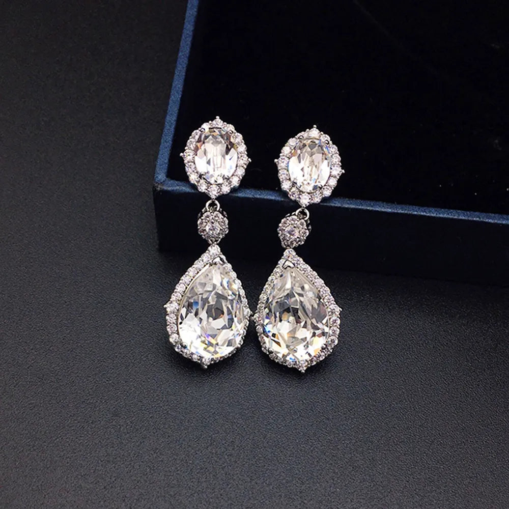 Boucles d'oreilles pendantes halo en cristal bleu saphir de luxe pour femme