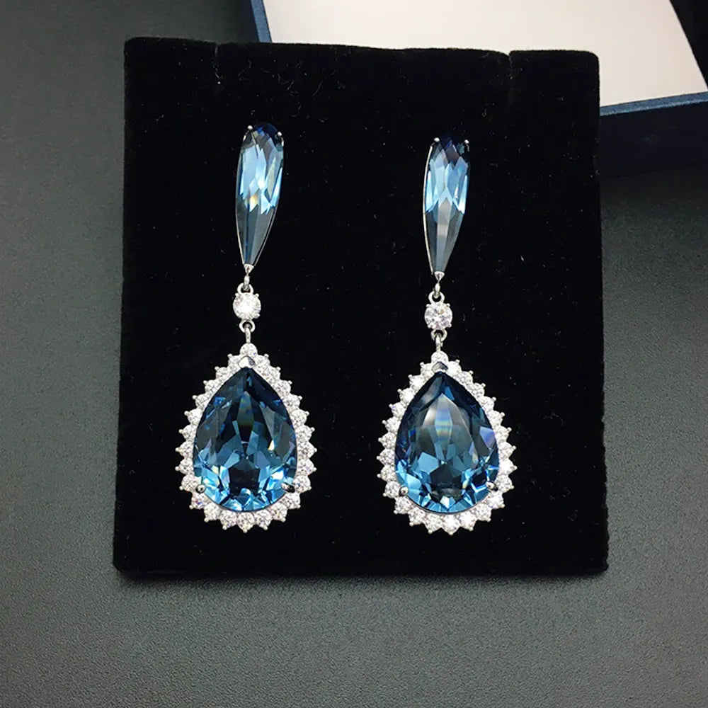 Boucles d'oreilles pendantes halo en cristal bleu saphir de luxe pour femme