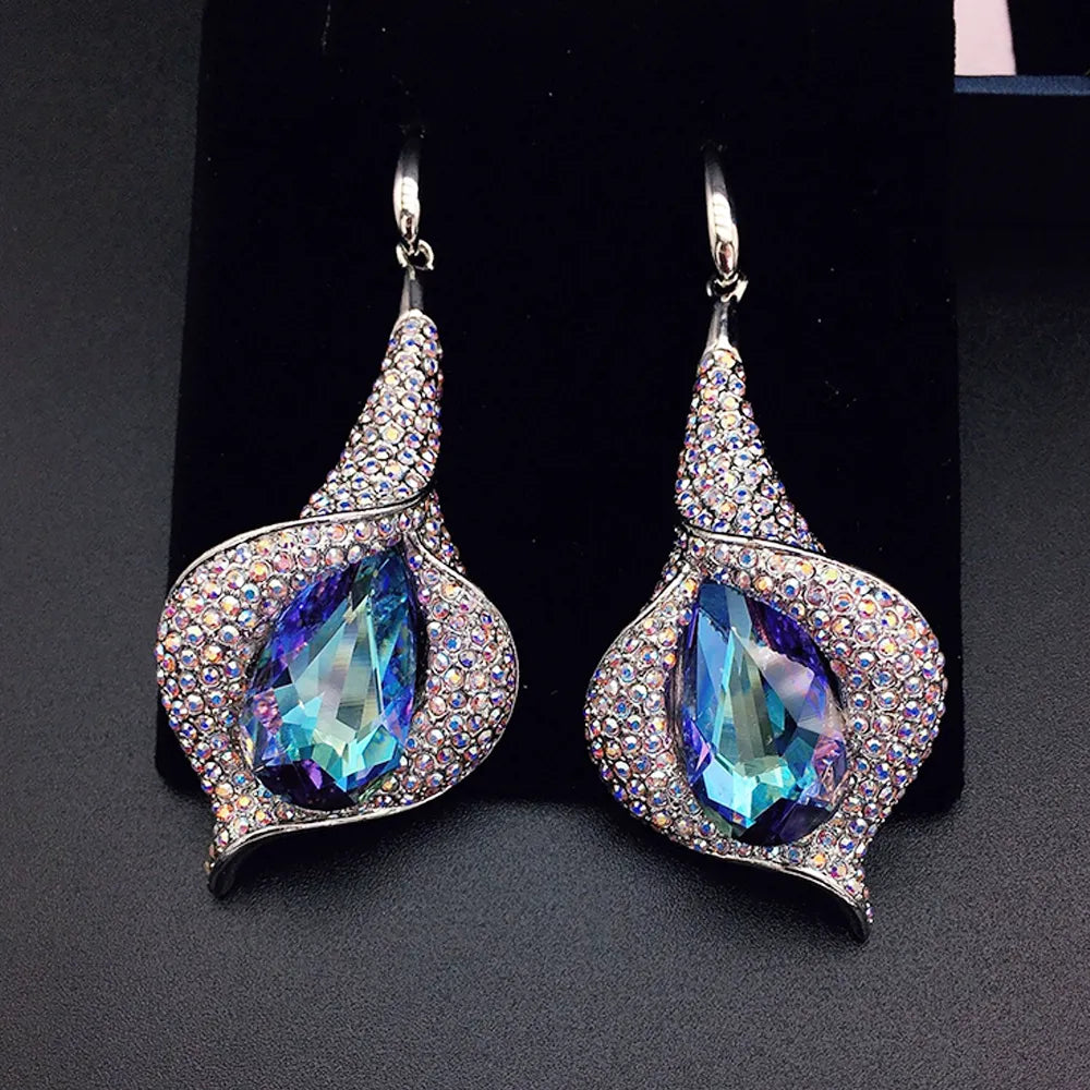 Boucles d'oreilles pendantes de luxe en forme de pétale de cristal bleu aurore pour femmes