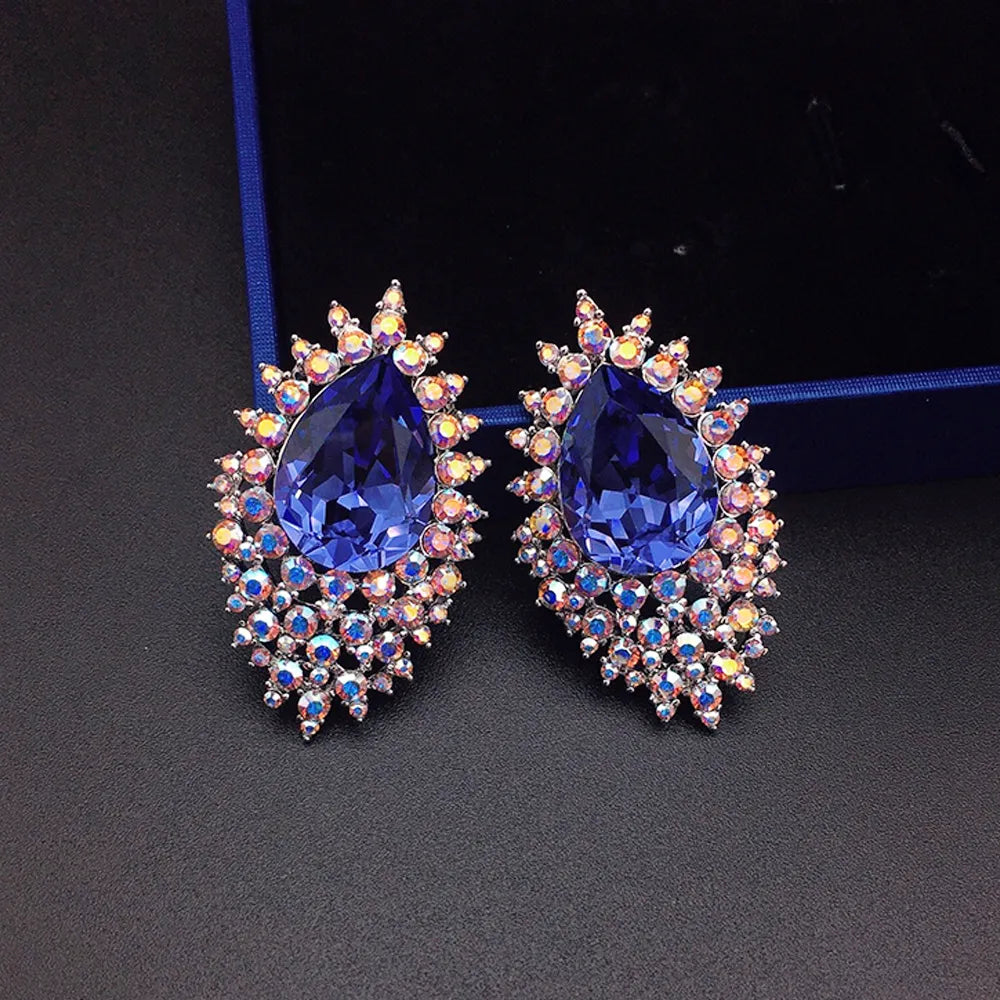 Boucles d'oreilles de luxe en cristal bleu roi avec halo céleste