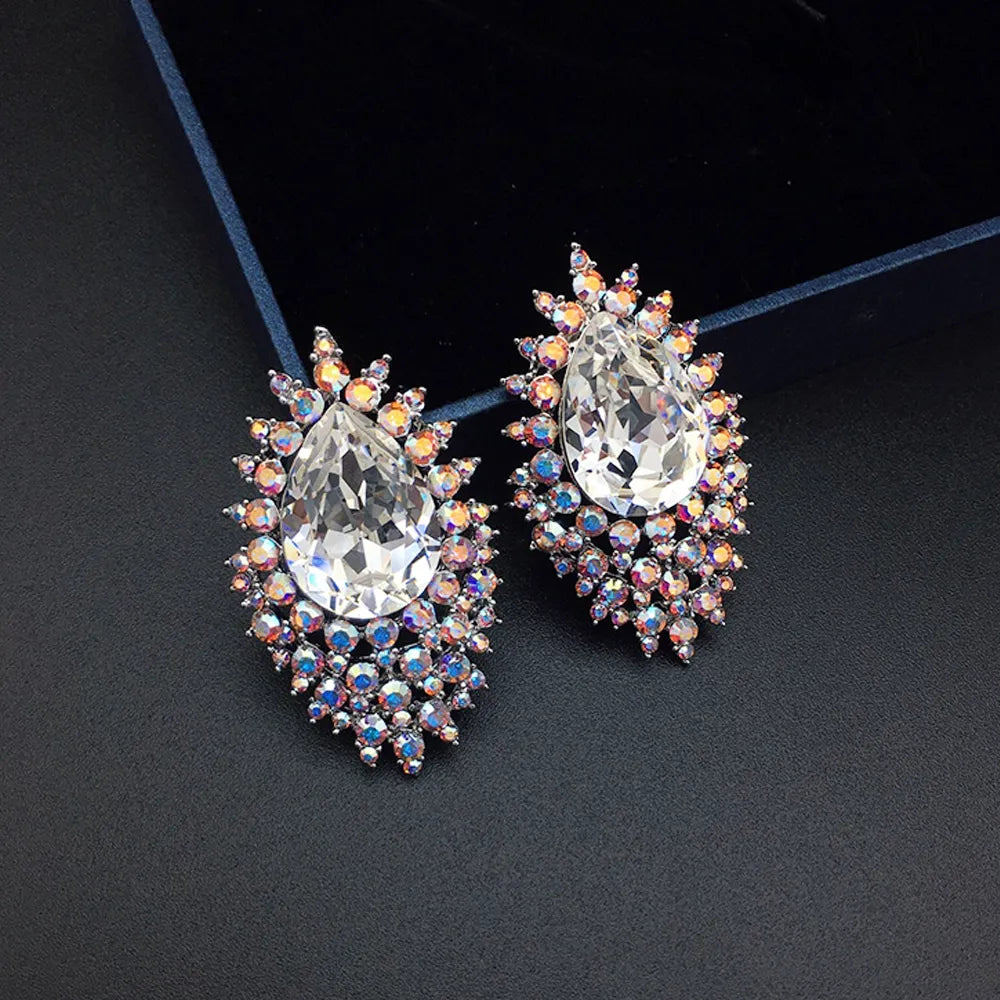 Boucles d'oreilles de luxe en cristal bleu roi avec halo céleste
