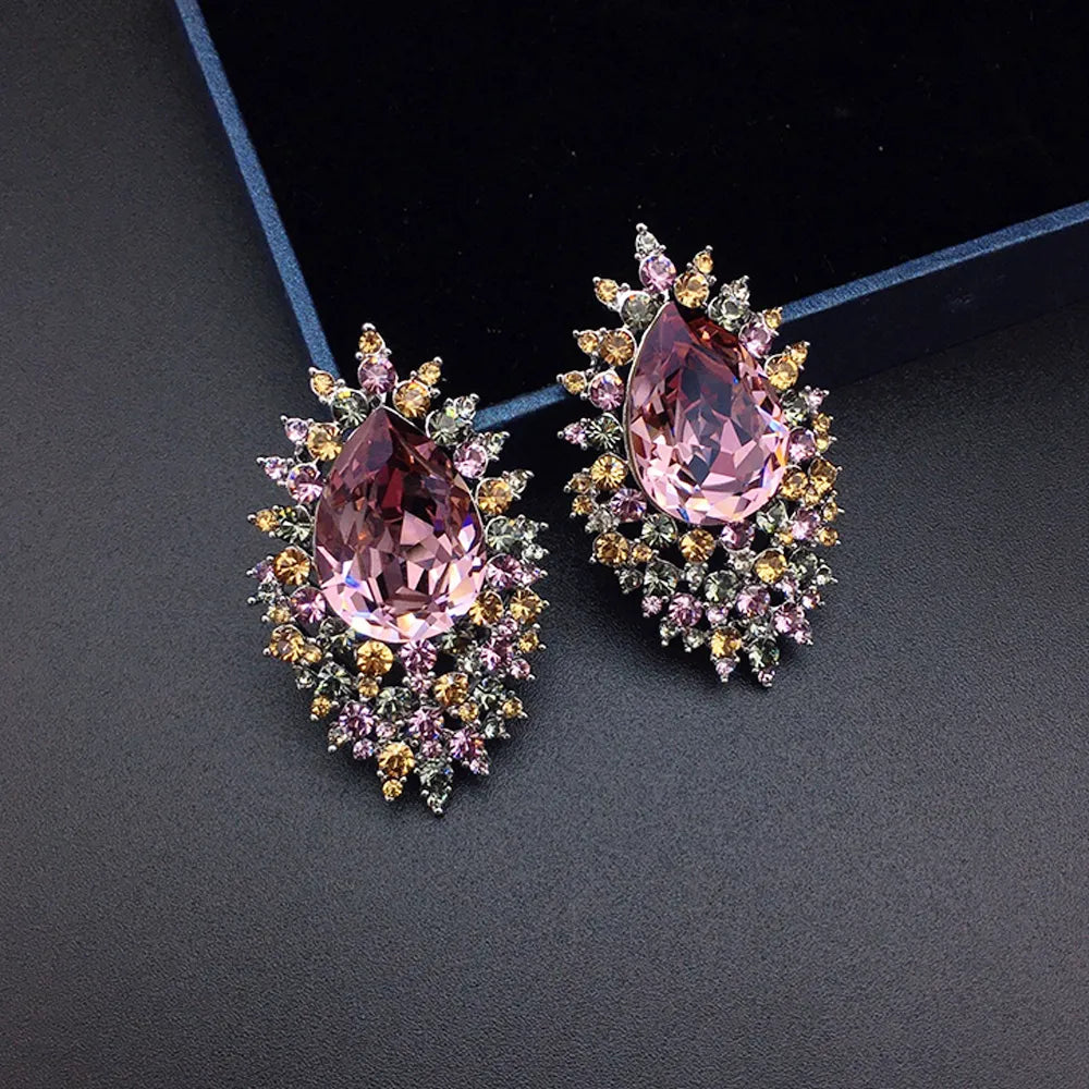 Boucles d'oreilles de luxe en cristal bleu roi avec halo céleste