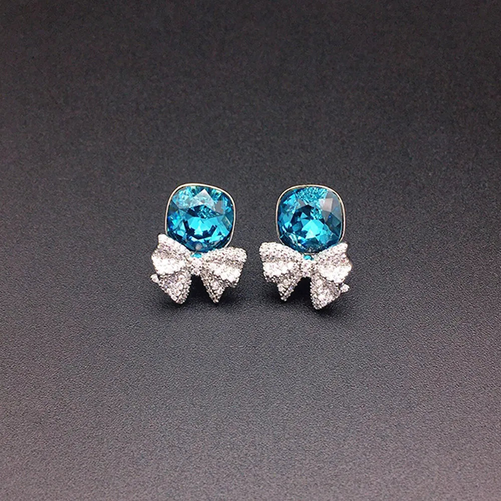 Boucles d'oreilles clous nœud en cristal rose pour femmes