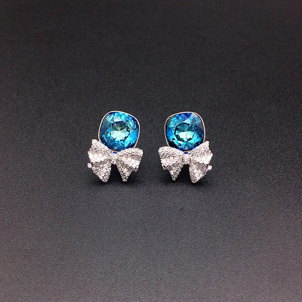 Boucles d'oreilles clous nœud en cristal rose pour femmes