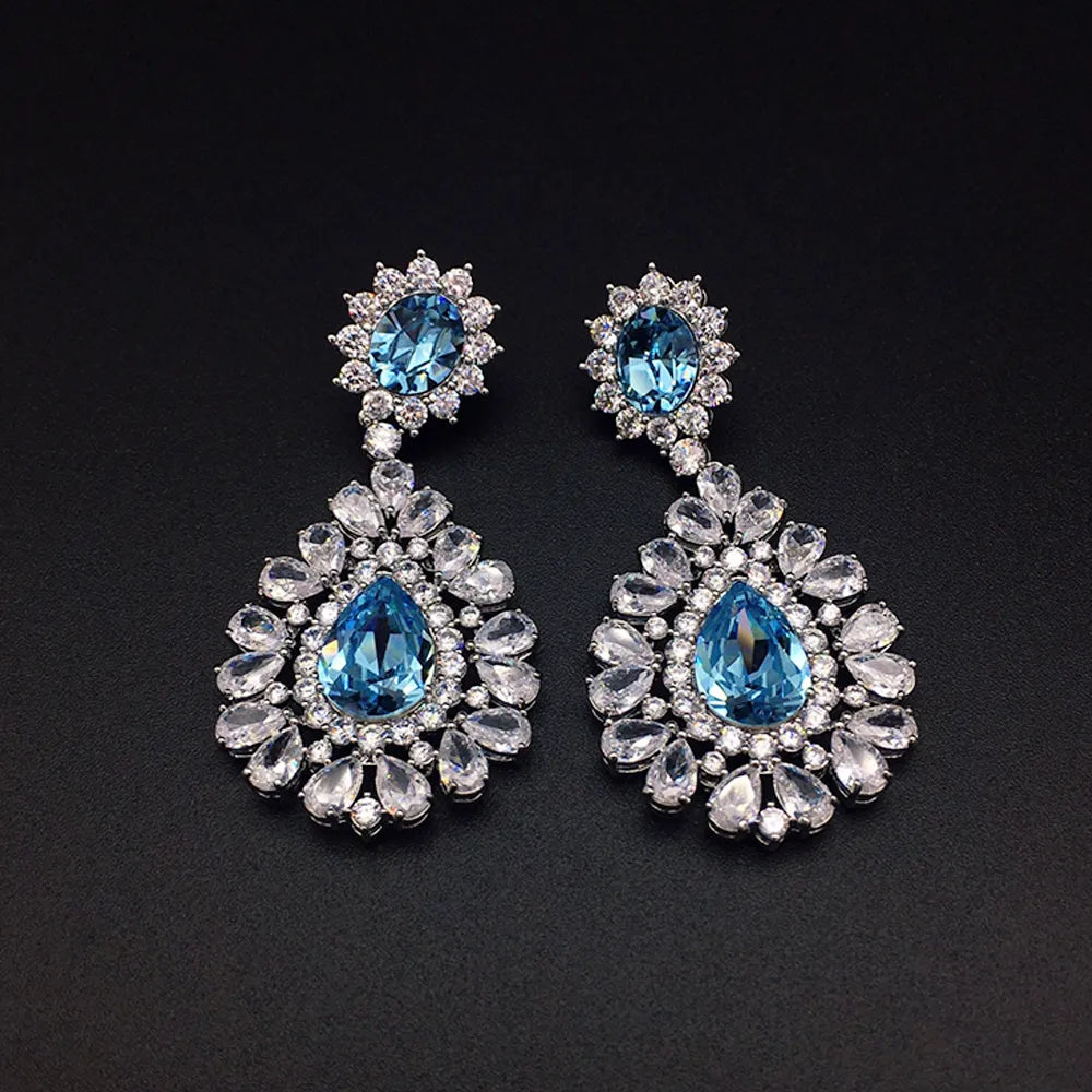 Boucles d'oreilles chandelier de luxe en cristal rose rubis