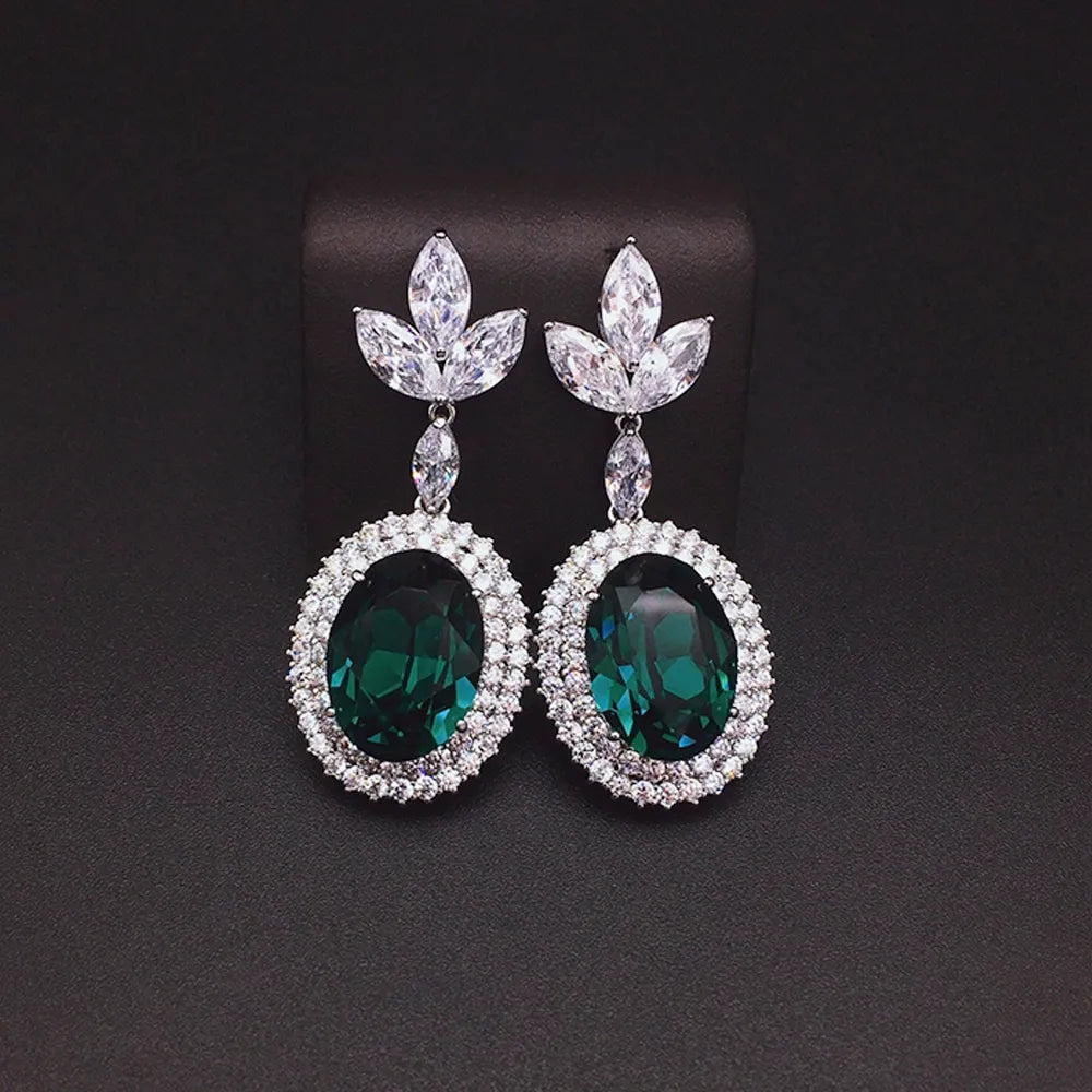Boucles d'oreilles pendantes de luxe en cristal ovale bleu saphir pour femme