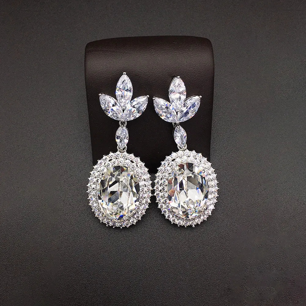 Boucles d'oreilles pendantes de luxe en cristal ovale bleu saphir pour femme