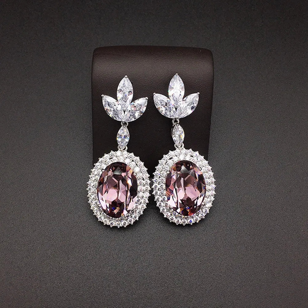 Boucles d'oreilles pendantes de luxe en cristal ovale bleu saphir pour femme